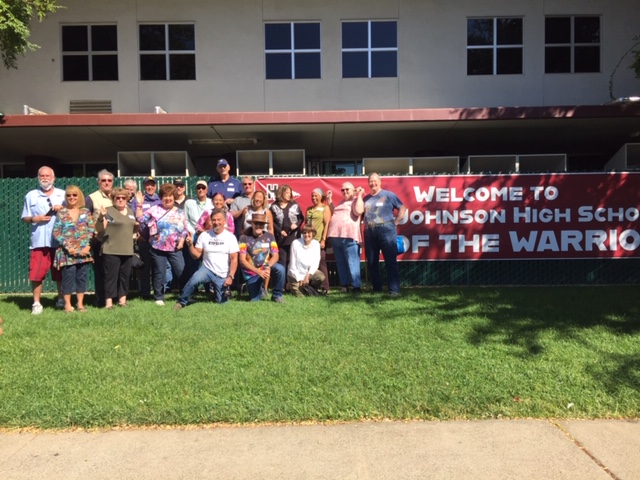 A group of classmates took a tour of the school.